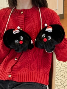 Detail of plush snowman mittens with red holiday hat and hanging string for winter wear