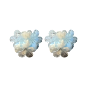 Elegant translucent blue and white flower stud earrings with a minimalist silver needle design