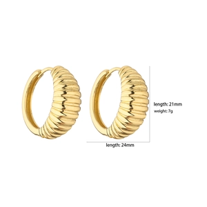 Detail view of gold-plated hoop earrings with ribbed texture and 21mm by 24mm dimensions