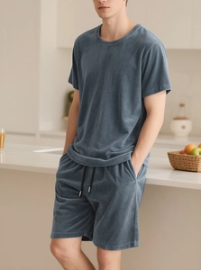 Blue men's loungewear set with short-sleeve T-shirt and drawstring shorts in a soft fabric