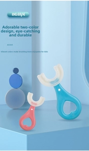 U-shaped manual kids toothbrushes in pink and blue with soft silicone bristles and heart handles