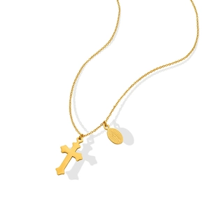 Collier vintage plaqué or avec pendentif croix et médaille de la Vierge Marie sur blanc