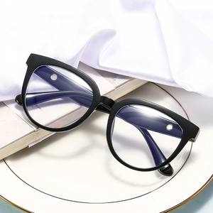 Retro oversized black frame glasses with anti-blue light coating on minimalist background