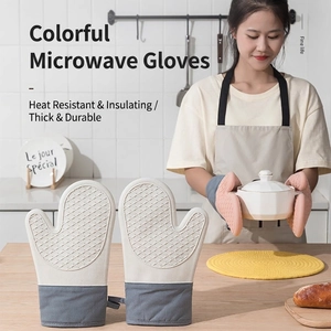 Silicone heat resistant oven mitts with anti-slip grip for safe baking and cooking