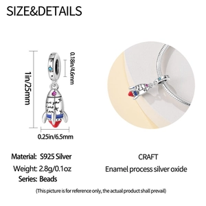 Detail of S925 silver rocket charm with enamel finish and love you more than engraving