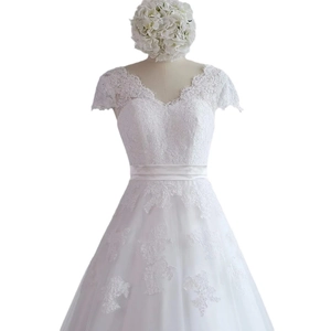 Elegant French V-neck lace wedding dress with puffy tulle skirt and satin waistband