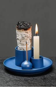 Ceramic candle holder set in Morandi blue with sage bundle and incense on a tray