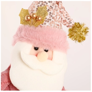 Detailed view of pink sequin Santa hat with golden leaf decor and fluffy white beard