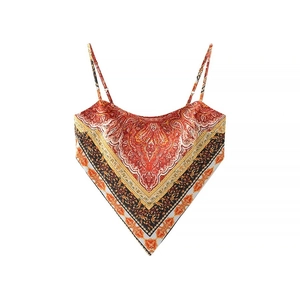 Detail of bohemian paisley print scarf-style camisole in orange-red satin fabric