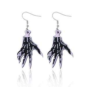 Gothic Halloween skeleton hand earrings in purple and black acrylic with metal hooks
