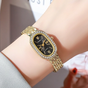 Close-up of women's gold quartz watch with a diamond-encrusted bezel and black oval dial