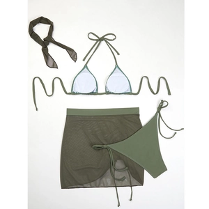 Detailed flat lay of olive green 4-piece bikini set with mesh skirt and matching scarf