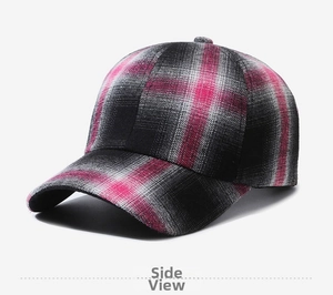 Macro detail of the pink and grey checkered fabric and stitching on this baseball cap