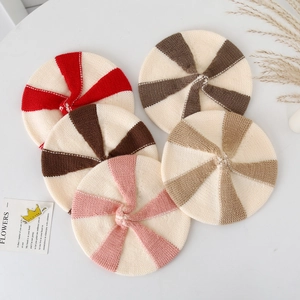Set of 5 colorful patchwork knitted beret hats for babies with spiral pumpkin design