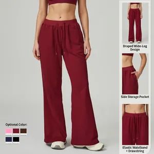Women's high waist wide leg sweatpants with drawstring and side pockets in burgundy red