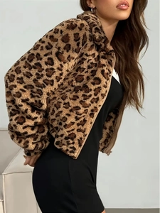 Women's leopard print plush zip jacket with warm hood shown from a stylish side angle