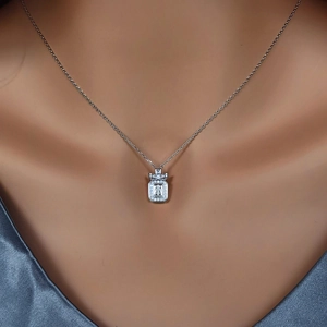 Elegant S925 sterling silver perfume bottle necklace with iris relief and crystals
