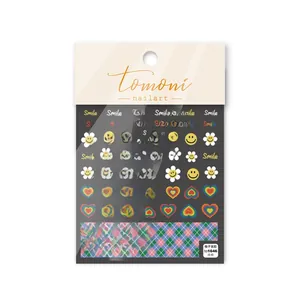 Detailed 5D embossed nail stickers with colorful smiley faces and daisies on card