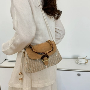 Vintage woven shoulder bag with bamboo handle and embroidery detail for women