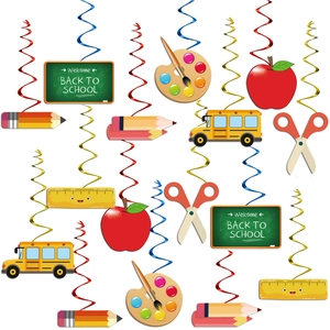Detailed view of back to school foil swirls with school bus and apple cardstock cutouts