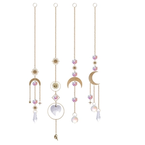 Set of four gold sun and moon crystal catchers with prism pendants for garden decor