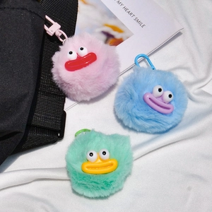 Funny pompom keychain set with big eyes and wide mouths in pink blue and mint green colors