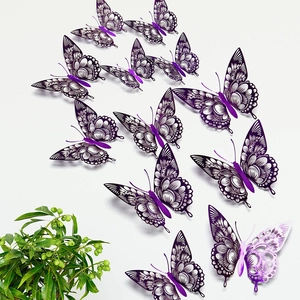 Detailed view of hollow purple and gradient pink butterfly wall stickers on a white wall