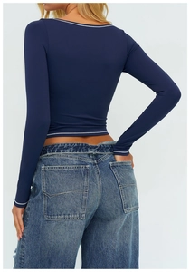 Top corto da yoga blu navy con bordi bianchi a contrasto e trama in maglia elasticizzata