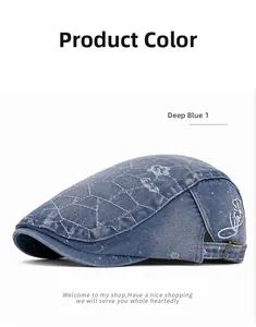 Detailed embroidery on vintage deep blue denim newsboy cap with adjustable metal buckle