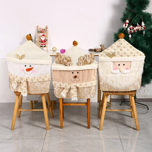 Christmas chair covers featuring snowman, reindeer, and Santa Claus for holiday decor
