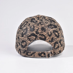 Detail view of the leopard print baseball cap featuring an adjustable silver metal buckle