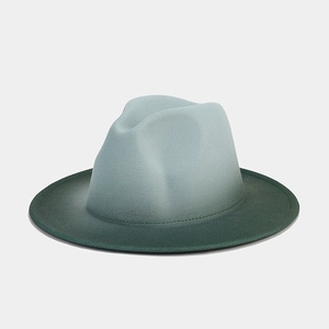 Detail view of American style wool felt fedora with blue to dark green gradient finish