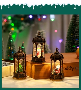 Close-up of vintage bronze Christmas lanterns with LED lights and holiday scene motifs