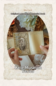 Close-up of vintage lace art paper featuring religious icons for scrapbooking