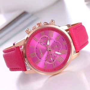 Detail of rose gold case and pink leather strap on a Geneva fashion quartz watch