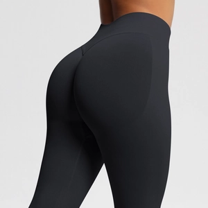 Close-up of high-waisted seamless black yoga leggings with booty lifting seam design