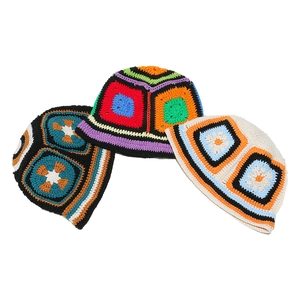 Detailed knit texture of bohemian crochet bucket hats in three vintage color patterns