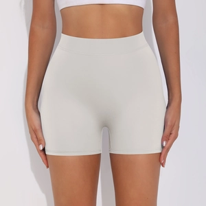 Close-up of seamless wide waistband on high-waist peach lift yoga shorts in light grey