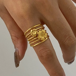 Bohemian gold plated titanium steel ring set featuring vintage floral engraving and beaded bands