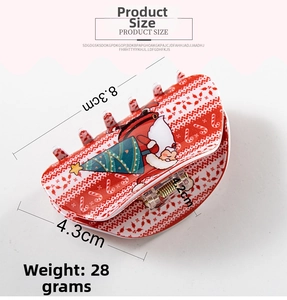 Detailed size view of red Christmas hair claw clip with Santa Claus and festive patterns