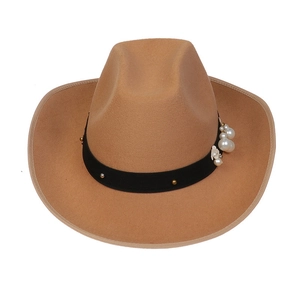 Top view of camel wool fedora hat featuring black band with pearl and rivet detailing