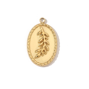 Detailed view of golden oval pendant with embossed olive branch and beaded frame texture
