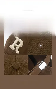 Detail of vintage brown corduroy baseball cap with beige embroidered R letter logo