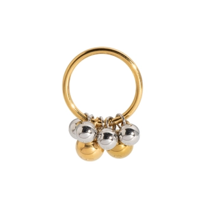 Detail of French vintage open ring featuring polished gold and silver metal bead charms