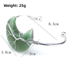 Detailed view of silver wire-wrapped green moon stone bracelet with size measurements