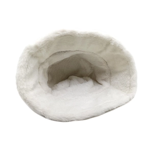 Close-up view of the soft white faux fur texture and inner lining of this bucket hat