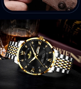Close-up of luxury men's business watch with black dial and two-tone steel strap