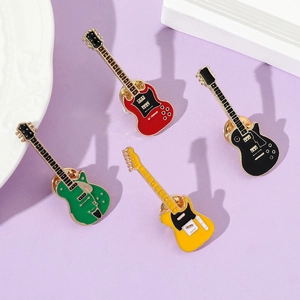 Detailed set of four colorful electric guitar enamel pins in red, black, green and yellow