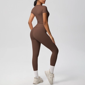 Women's two-piece yoga set with slim short sleeve t-shirt and high waist chocolate leggings