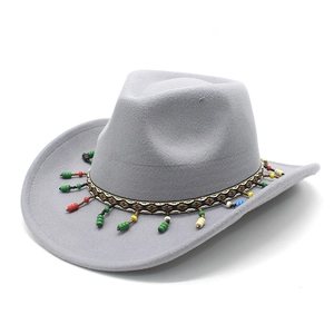 Detail of grey-purple wool fedora featuring an ethnic woven band with multi-color beads